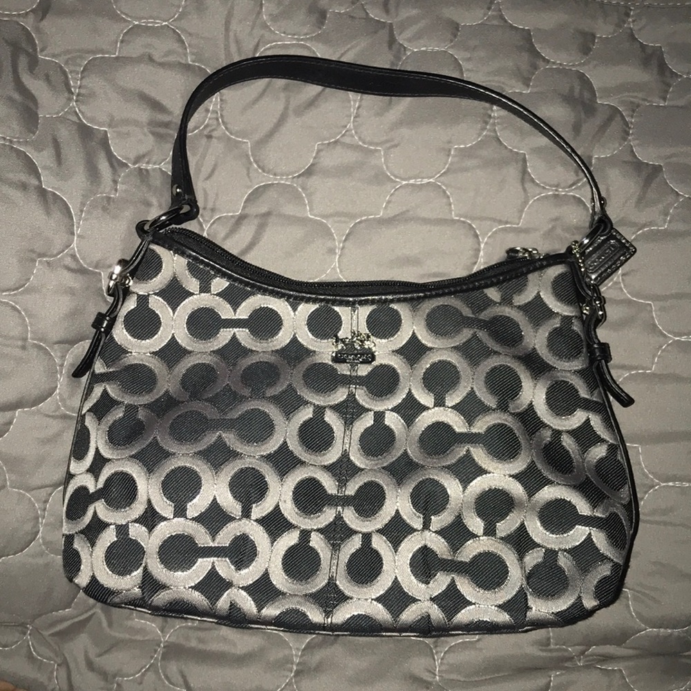 Coach handbag 10 in. Across, 6 in top to bottom.